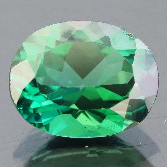 Attention grabbing 5.27ct emerald green Mystic Topaz