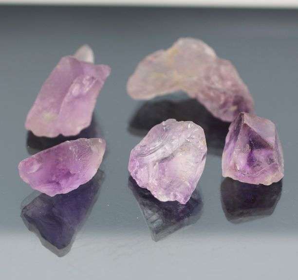 Collectors untreated 203.92ct uncut Amethyst set