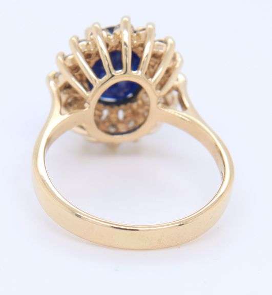Fabulous Yellow Gold Oval Blue Sapphire and Diamond Halo Ring