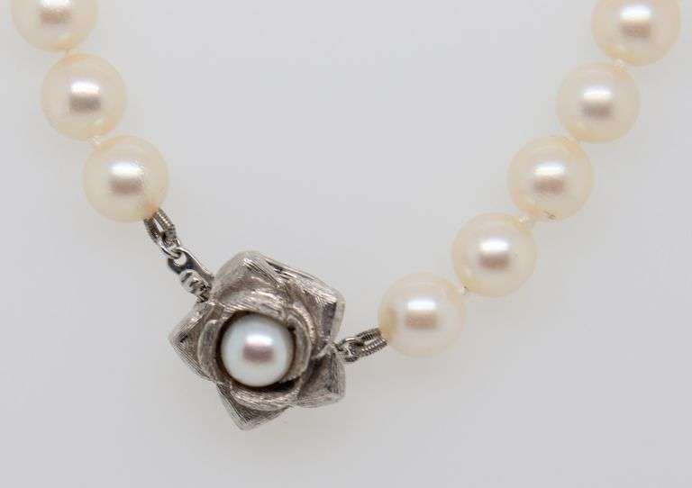 Elegant White Fresh water Pearl Necklace with 14kt White Gold Flower Clasp