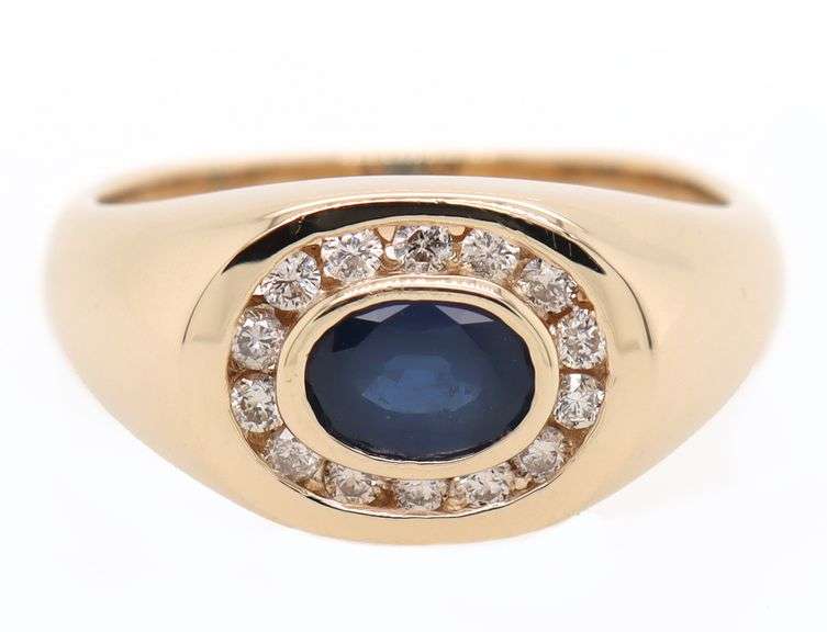 1.10ct Oval Sapphire and 0.30ctw Diamond Frame Bezel Set Ring in 14K
