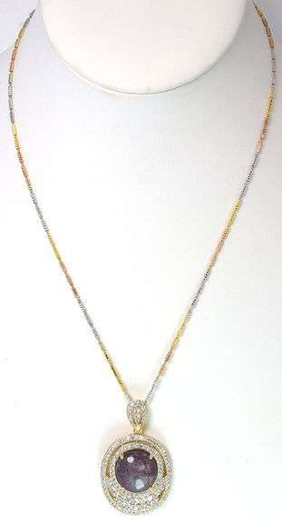 Breathtaking Massive 23.79 Carat Ruby and White Sapphire Pendant with Yellow Gold Overlay.