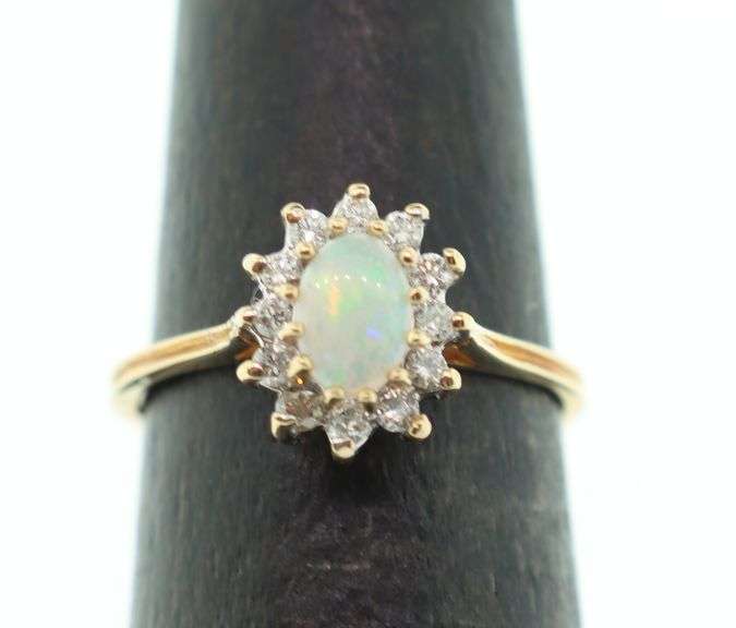Enchanting Opal 14k Gold Ring with Diamond Accents