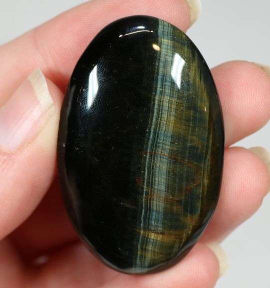 Dramatic 132ct Tiger Eye cabochon