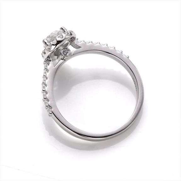 Sparkling 1 Ct Pear Cut White E-F Moissanite Ring