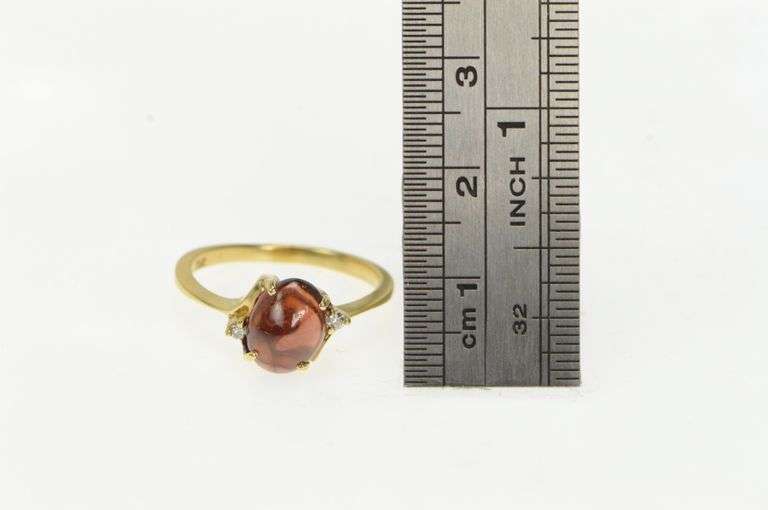 10K Yellow Gold Oval Garnet Cabochon Diamond Bypass Ring