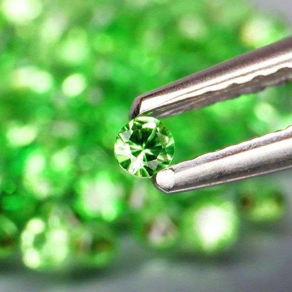 Tremendous 2.76ct untreated spring green Tsavorite set