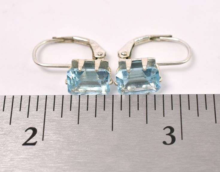 Blue Topaz Dangle Earrings In Sterling Silver