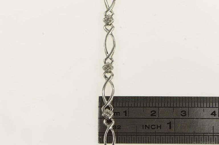 10K White Gold Diamond Criss Cross Curvy Link Tennis Bracelet