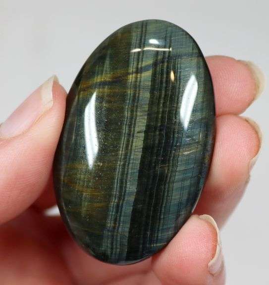 Dramatic 132ct Tiger Eye cabochon