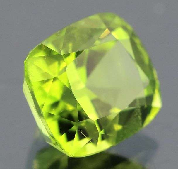 Superb 3.92ct cushion cut apple green Peridot