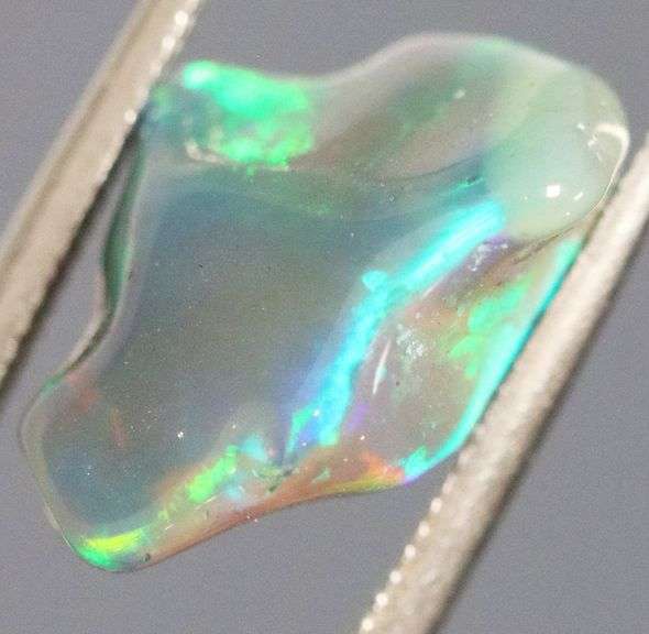 High fire collectors 2.68ct free form black Opal vein