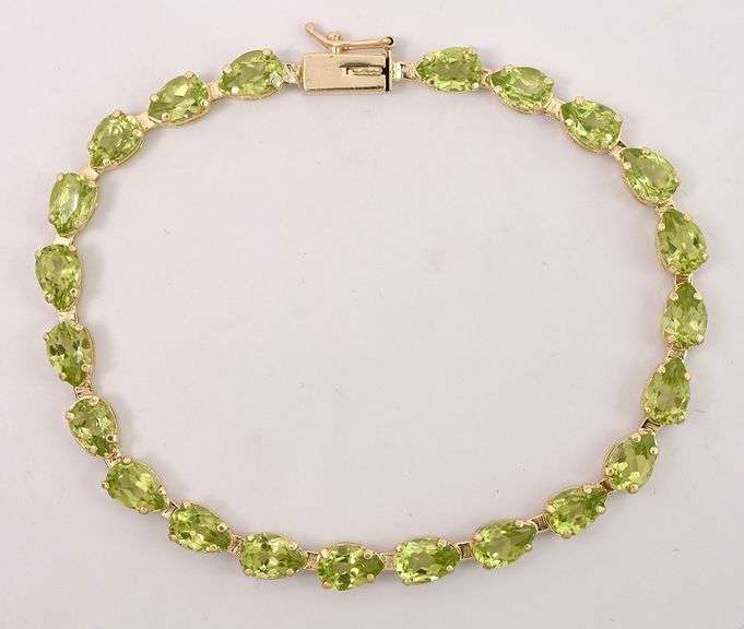 Amazing Peridot Gem Tennis Bracelet In 14K Yellow Gold