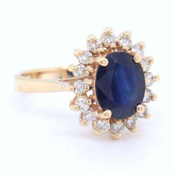 Fabulous Yellow Gold Oval Blue Sapphire and Diamond Halo Ring