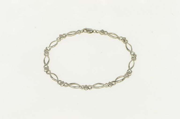 10K White Gold Diamond Criss Cross Curvy Link Tennis Bracelet