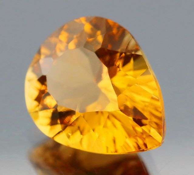 Simply divine 8.68ct concave cut high fire golden Citrine