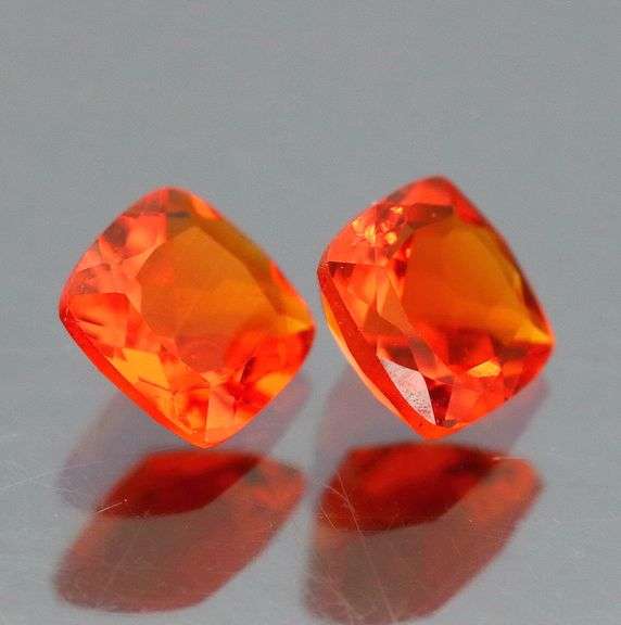 Vibrant top color .97ct bright orange Fire Opal pair