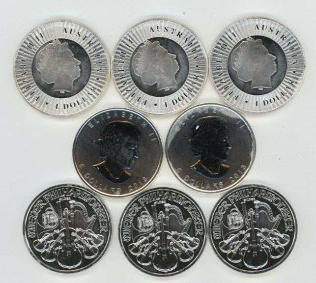 Super lot of 8 Special BU 1 Troy oz pure .999 fine silver World coins