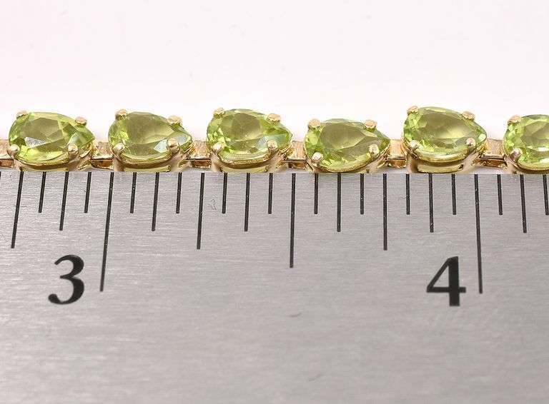 Amazing Peridot Gem Tennis Bracelet In 14K Yellow Gold