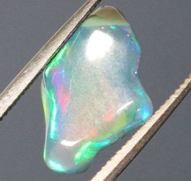 High fire collectors 2.68ct free form black Opal vein