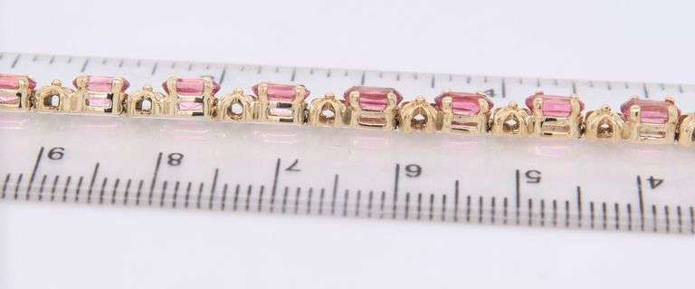 Handsome Yellow Gold oval Pink Tourmaline XO Bracelet