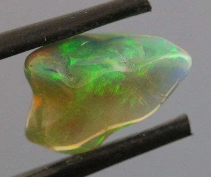 High fire collectors 3.07ct free form black Opal vein