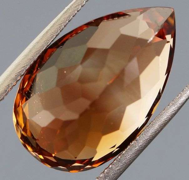 Stunning 8.76ct pear cut Imperial Topaz