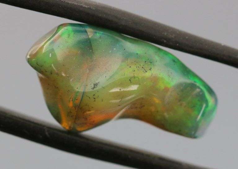 High fire collectors 5.92ct free form black Opal vein