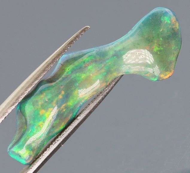 High fire collectors 3.61ct free form black Opal vein