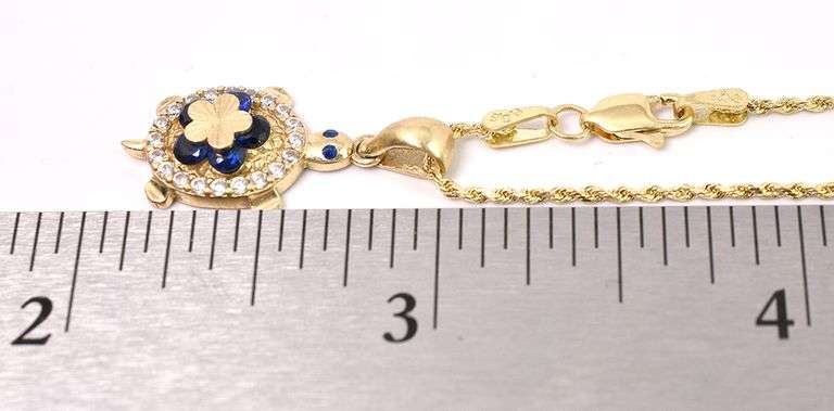 Beached Blue Sapphire Turtle Pendant In 14K Yellow Gold
