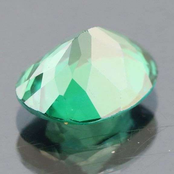 Attention grabbing 5.27ct emerald green Mystic Topaz