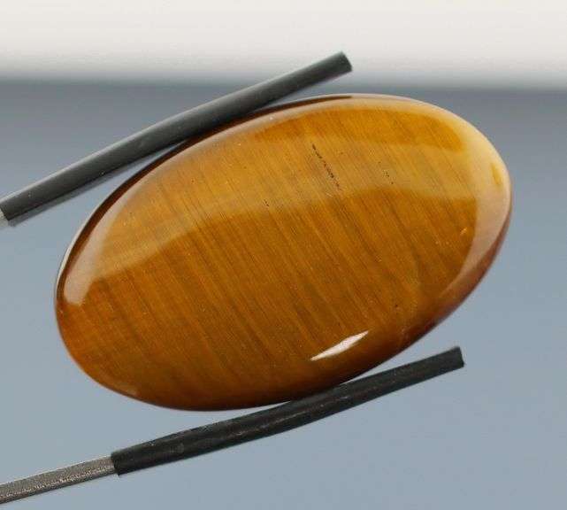 Full body shimmer! 42.58ct Golden Tiger Eye cabochon