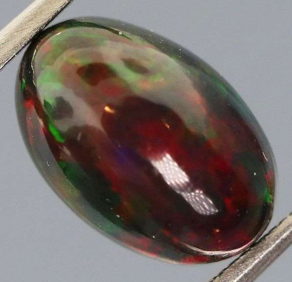 Magnificent 2.37ct full body flashing Black Opal