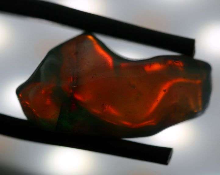 High fire collectors 5.92ct free form black Opal vein