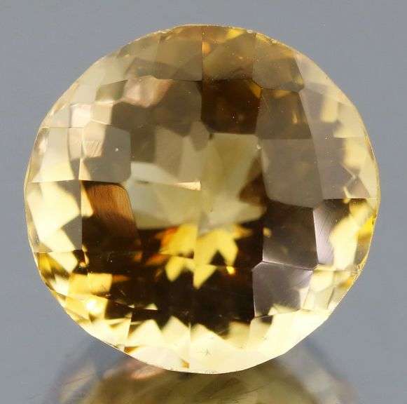 Fiery 10.19ct round cut Citrine -Checker cut!