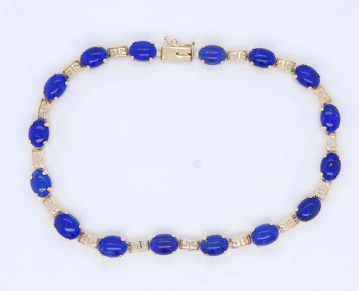 Attractive Yellow Gold Oval Lapis and Greek Key Station Bracelet