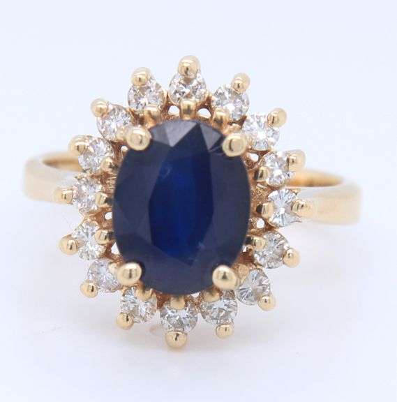 Fabulous Yellow Gold Oval Blue Sapphire and Diamond Halo Ring