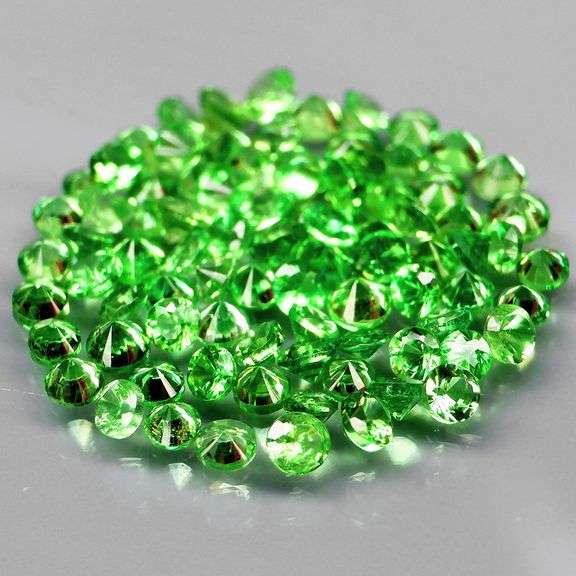 Tremendous 2.76ct untreated spring green Tsavorite set