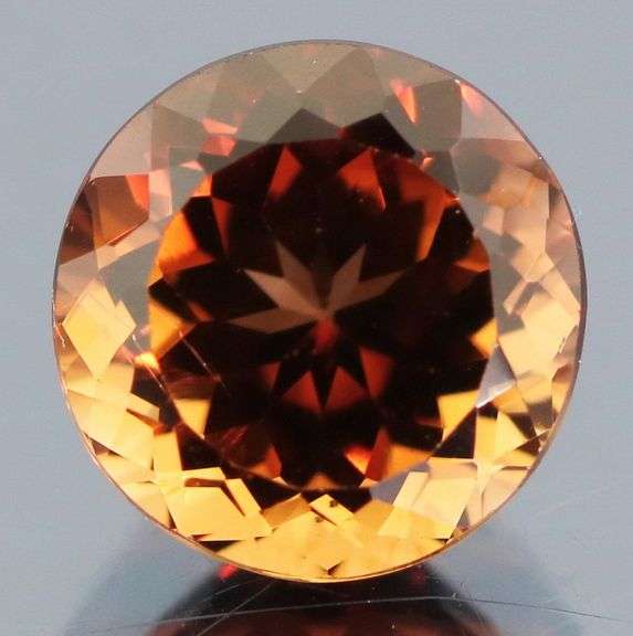 Lavish 4.32ct high fire Imperial Topaz solitaire
