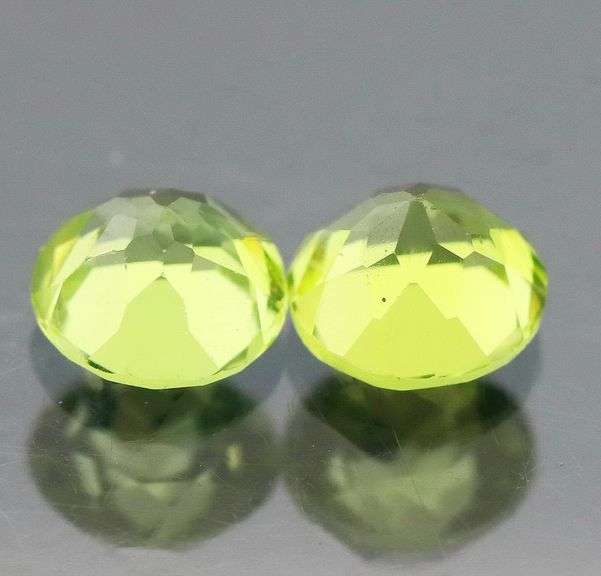 Gorgeous 1.09ct heavy flashing Peridot pair