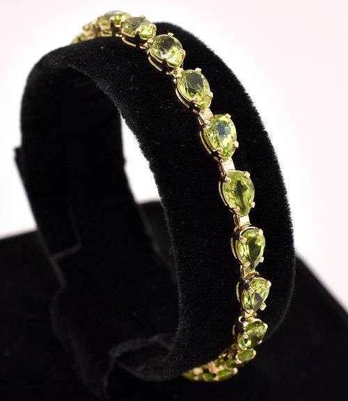 Amazing Peridot Gem Tennis Bracelet In 14K Yellow Gold