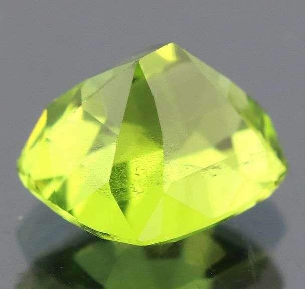 Superb 3.92ct cushion cut apple green Peridot