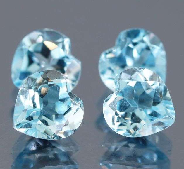 Superb quality 9.49ct 4 piece sky blue Topaz set