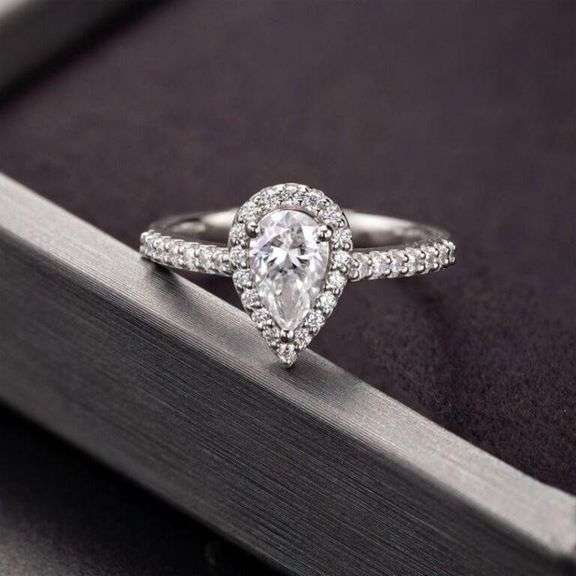 Sparkling 1 Ct Pear Cut White E-F Moissanite Ring