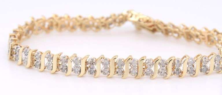 Gorgeous Yellow Gold 0.50ctw Diamond S Link Tennis Bracelet