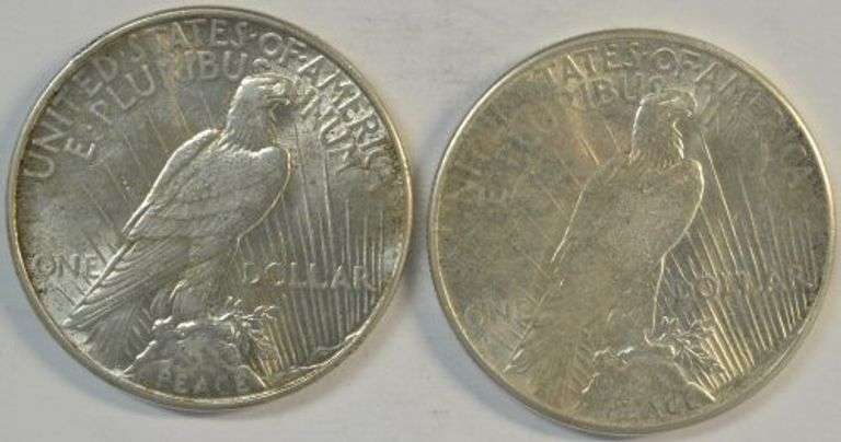 Real flashy 1926 and 1934 Peace Silver Dollars. Nice