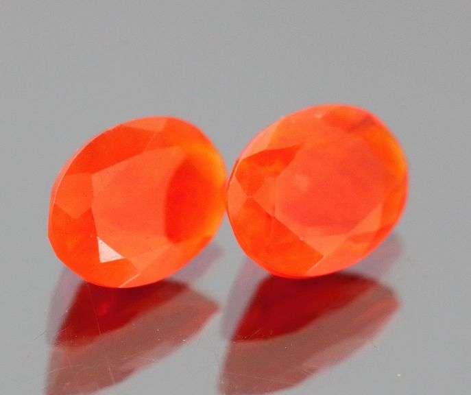 Vibrant top color 1.45ct bright orange Fire Opal pair