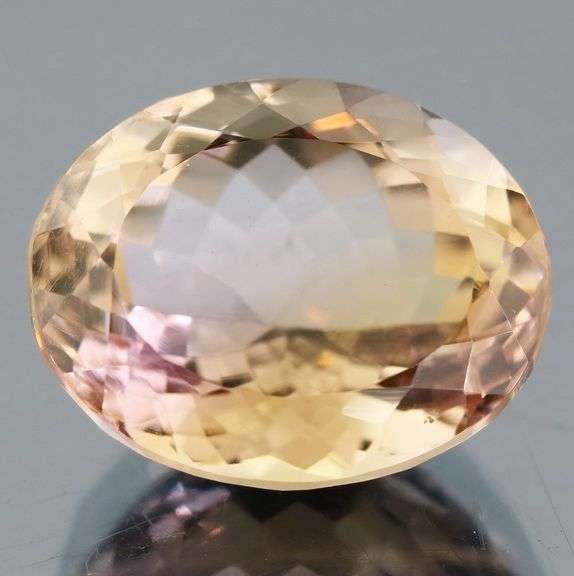 Eye clean 14.30ct unheated real Bolivian Ametrine