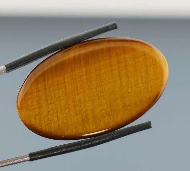 Full body shimmer! 42.58ct Golden Tiger Eye cabochon