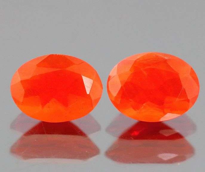 Vibrant top color 1.45ct bright orange Fire Opal pair